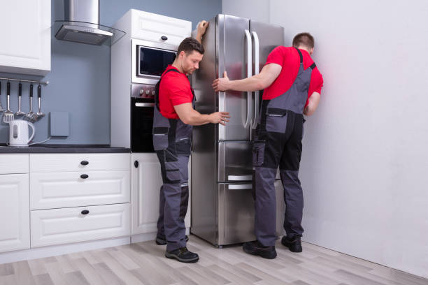 Samsung double door fridge repair technician diagnosing a refrigerator cooling problem.